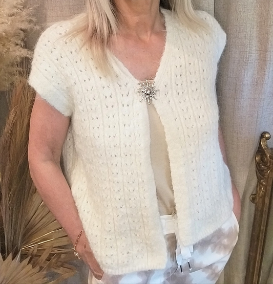Gilet sans manche broche soleil