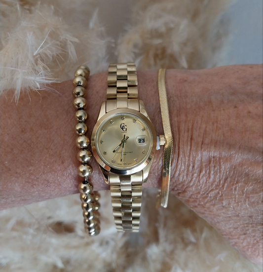 Montre Monaco dorée  en acier inoxydable